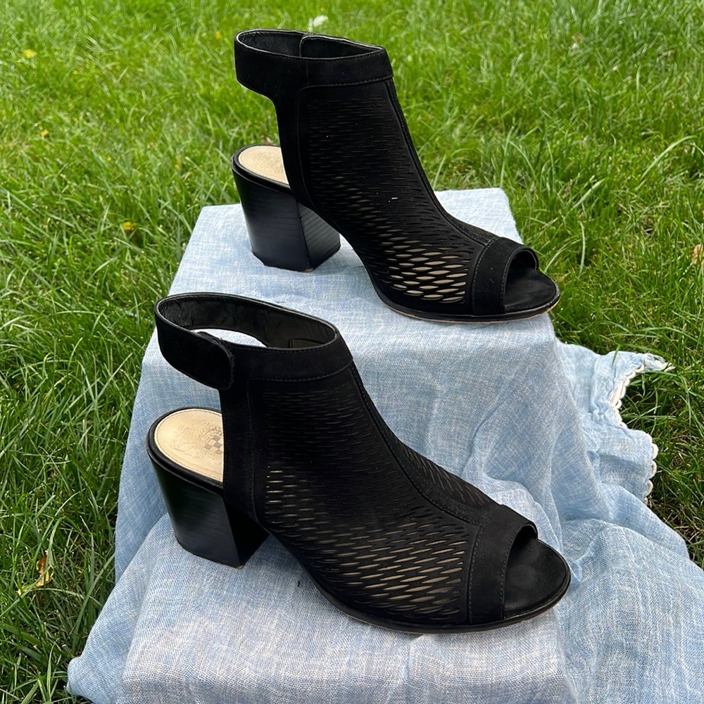 Vince Camuto Genuine leather black booties. Intricate leather design
